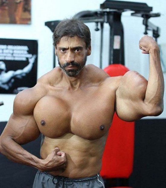 بازوهای این مرد بدنساز نیم متر است + عکس بازوهای این مرد بدنساز نیم متر است + عکس