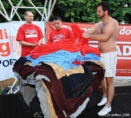 ثبت رکورد خنده دار با پوشیدن 245 تی شرت +عکس
