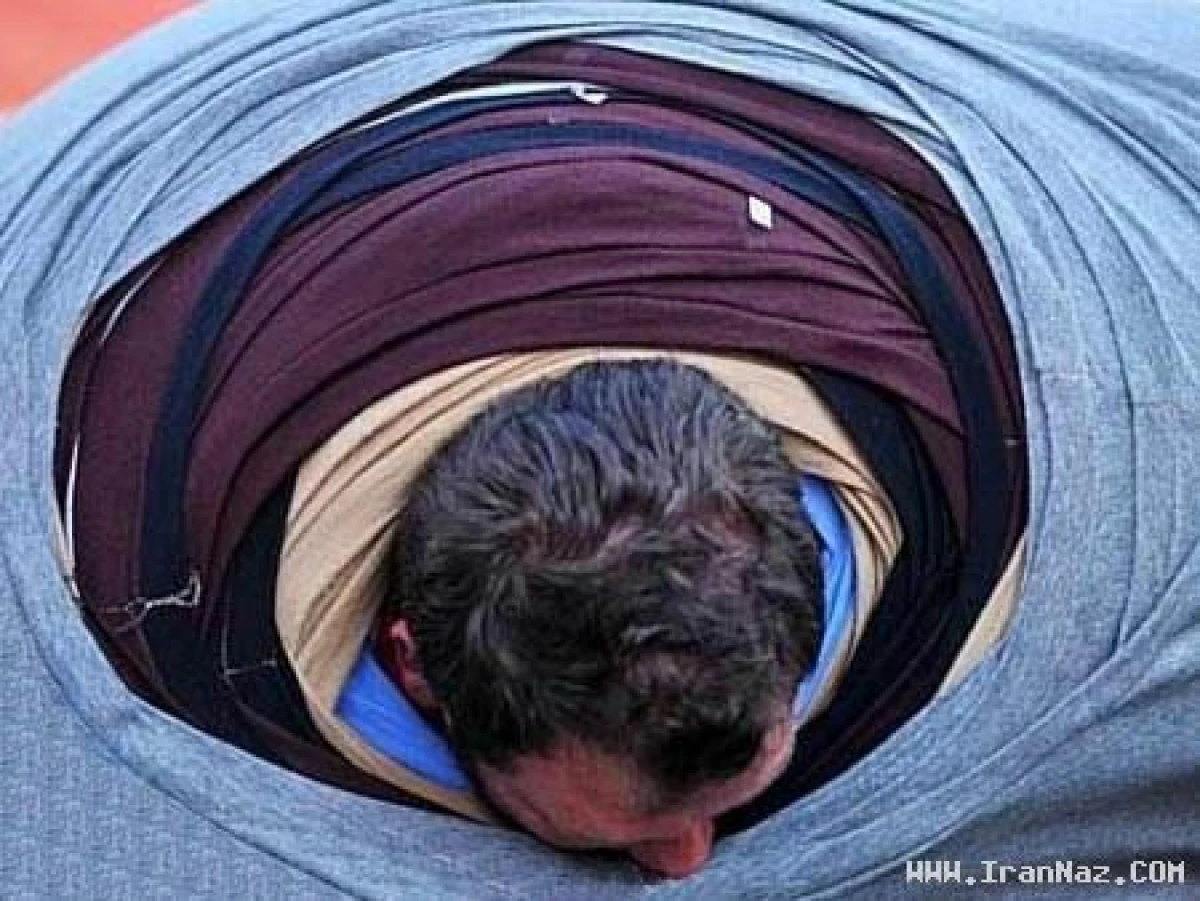 ثبت رکورد خنده دار با پوشیدن 245 تی شرت +عکس