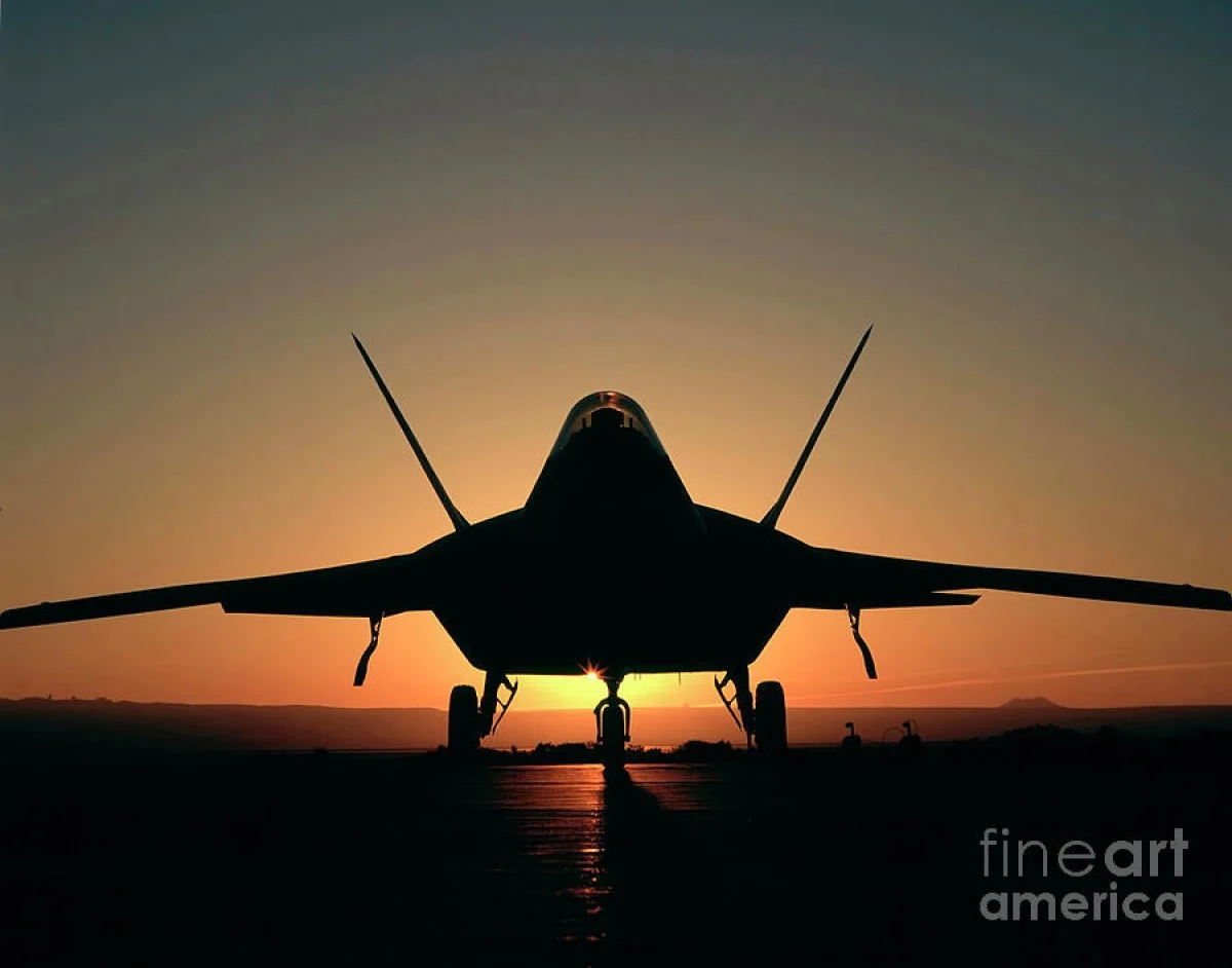 2025-11-24_17-34-05_028071-meylesokhan-ir 1-silhouette-of-a-f-22-raptor-stocktrek-images